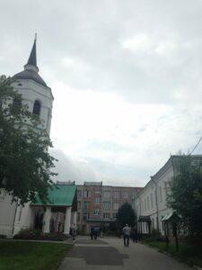 The monastery school is the building on the right